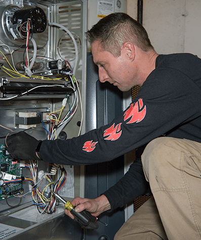 Always Ready Repair technician is servicing an American Standard furnace in Orland Park, IL